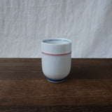 Saikai Ceramics: Red Trim, White Porcelain Yunomi Tea Cup with Blue Accents 150 ml - yumenet.live